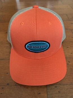 breathe easy, trucker hat, kwes / be-1251 orange / tan